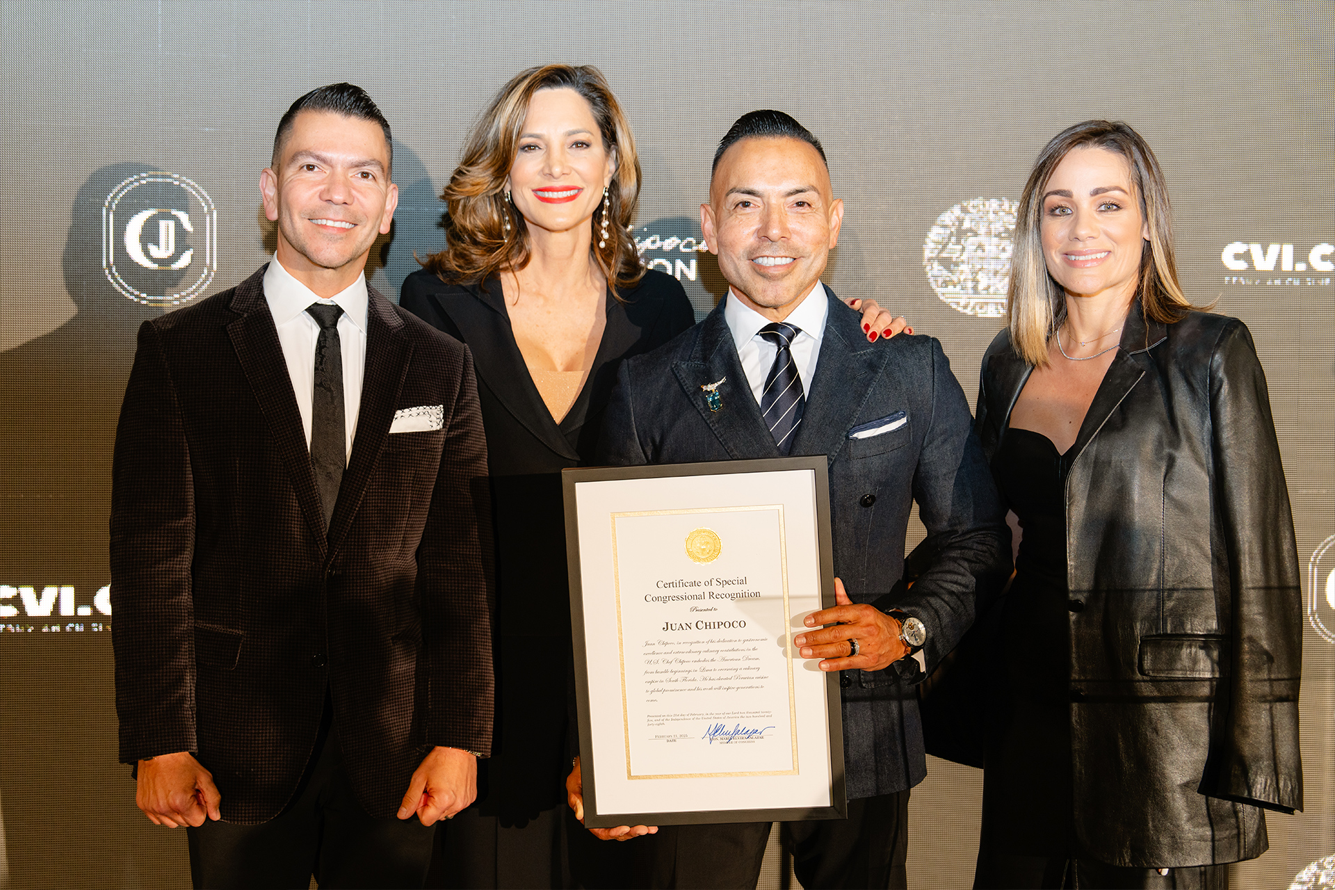 Photo of Juan Chipoco receiving the special congressional recognition