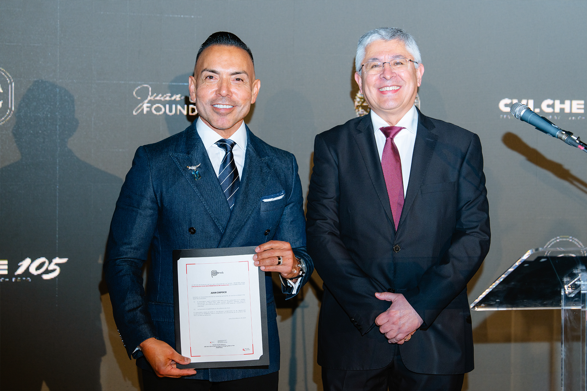 Photo of Juan Chipoco receiving Marca Peru recognition