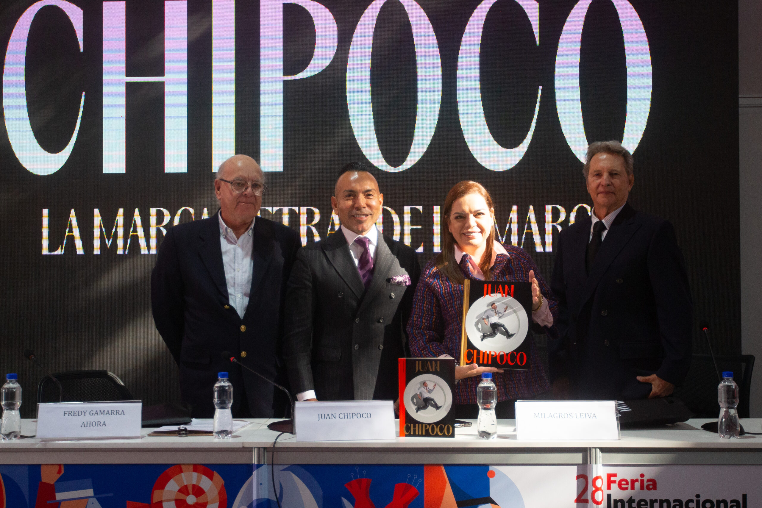 Photo of Juan Chipoco and panelists during the presentation of his book at FIL Lima 2024